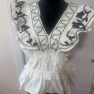 Chic White Ruffled Blouse with Black Embroidery
